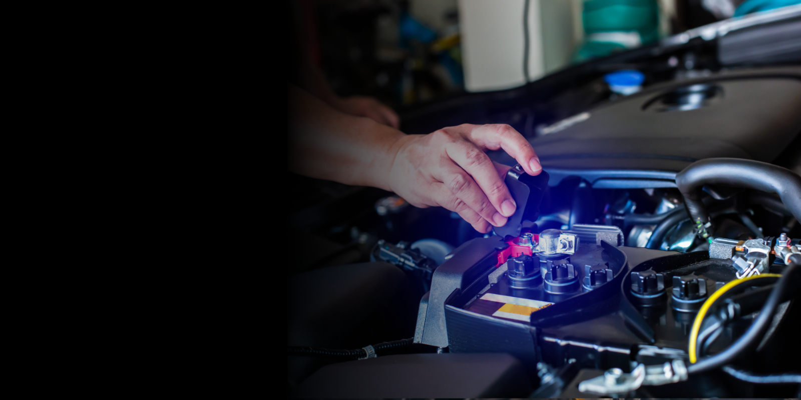 Hand of car mechanic with wrench. Auto repair garage